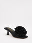 Black satin heeled mules with flower