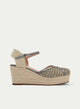 Espadrilla zeppa beige e piombo metallizzato.