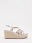 Silver wedges with crisscross straps for women