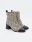 Ice booties stamped with black toe and heel