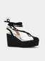 SANDALIA CUÑA NEGRA Y PLATA CON LAZADA