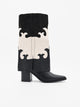 Botas de cowboy bicolor preta e bege.